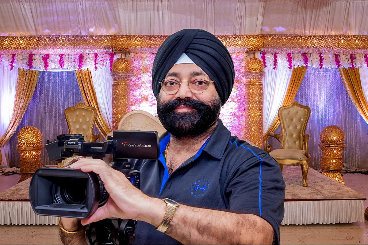Surinder Singh of DesiLens Photo and Film with the wedding photography and videography team